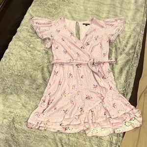 beautiful pink and violet colored faux wrap dress with loose flowy sleeve